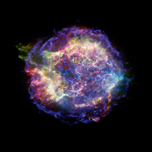 Image right: In this Chandra X-ray Observatory image of the supernova remnant Cassiopeia A , the red, green, and blue regions in this image show where the intensity of low, medium, and high-energy X-rays, respectively, is greatest.