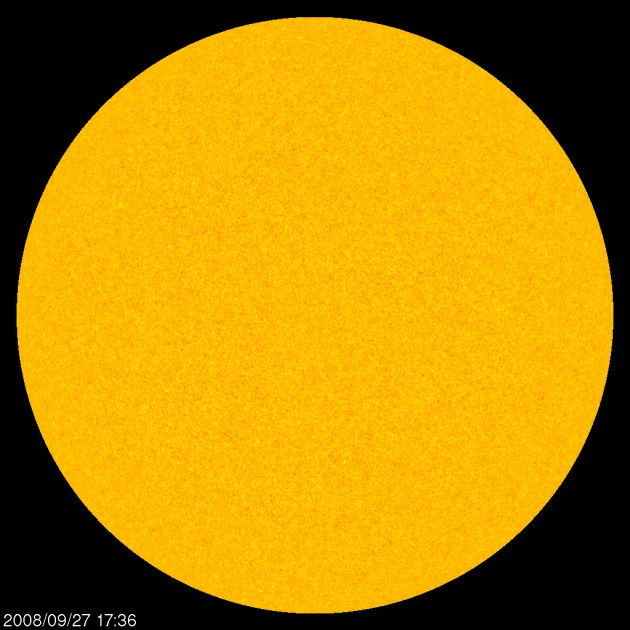 This visible-light photograph, taken in 2008 by NASA's Solar and Heliospheric Observatory (SOHO) spacecraft, shows the Sun's face free of sunspots. The Sun experienced 780 spotless days during the unusually long solar minimum that just ended. New computer simulations imply that the Sun's long quiet spell resulted from changing flows of hot plasma within it. Credit: NASA/SOHO