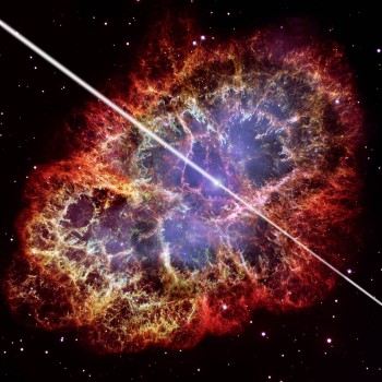 An artist's conception of the pulsar at the center of the Crab Nebula, with a Hubble Space Telescope photo of the nebula in the background. Researchers using the Veritas telescope array have discovered pulses of high-energy gamma rays coming from this object. Credit: David A. Aguilar / NASA / ESA