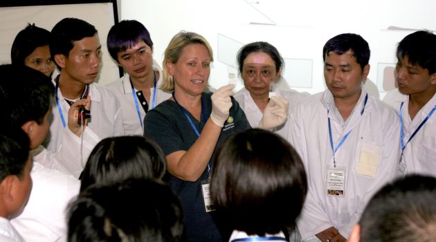 Dr. Suzan Murray, center, with participants of the Emerging Pandemic Threats workshop in Vietnam.