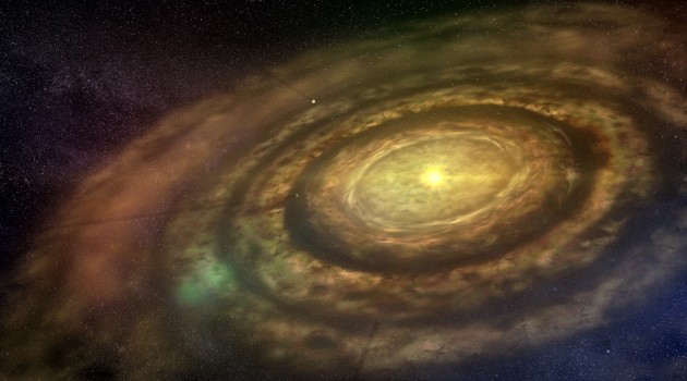This artist's conception shows a newly formed star surrounded by a swirling protoplanetary disk of dust and gas. Debris coalesces to create rocky 'planetesimals' that collide and grow to eventually form planets. The results of this study show that small planets form around stars with a wide range of heavy element content, suggesting that their existence might be widespread in the galaxy. (Credit: University of Copenhagen/Lars Buchhave)