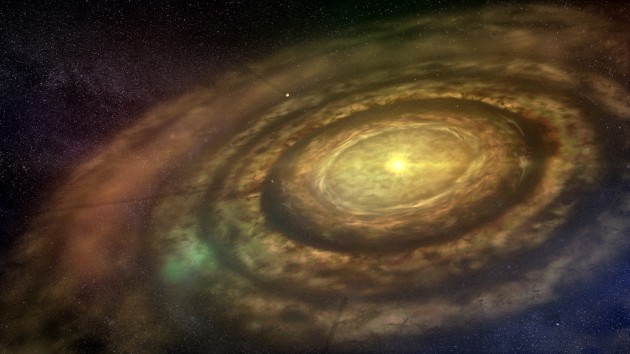Above: This artist's conception shows a newly formed star surrounded by a swirling protoplanetary disk of dust and gas. Debris coalesces to create rocky 'planetesimals' that collide and grow to eventually form planets. The results of this study show that small planets form around stars with a wide range of heavy element content, suggesting that their existence might be widespread in the galaxy. (Credit: University of Copenhagen/Lars Buchhave)