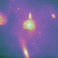 This still frame is taken from the Arepo-generated animation shown above. It demonstrates Arepo's key ability to produce realistic spiral galaxies. Previous simulations tended to yield blobby galaxies lacking distinct spiral structure. Credit: CfA/UCSD/HITS/M. Vogelsberger (CfA) & V. Springel (HITS)