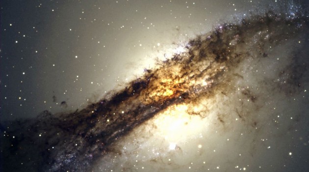Split-personality elliptical galaxy holds a hidden spiral