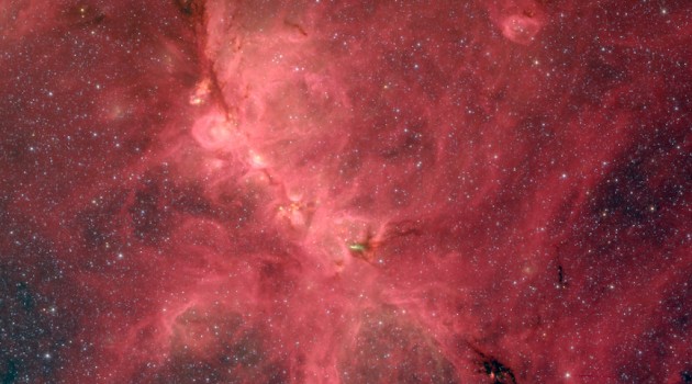 The Cat's Paw Nebula, also known as NGC 6334, comes alive in this infrared image from the Spitzer Space Telescope. A new study of this nebula finds that magnetic fields influence star formation on a variety of scales, from hundreds of light-years down to a fraction of a light-year. In this representative-color photo red shows light at a wavelength of 8 microns, green is 4.5 microns, and blue is 3.6 microns. (Image credit: S. Willis, CfA & NASA/JPL-Caltech/SSC)