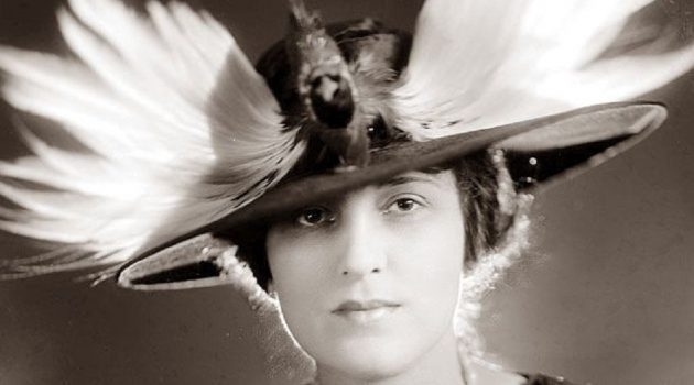 Woman in a feather hat.