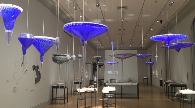 Norwood Viviano, "Global Cities," 2015, blown glass, cut vinyl, stainless steel cable, and MDF. Collection of Norwood Viviano, courtesy of Heller Gallery, New York.